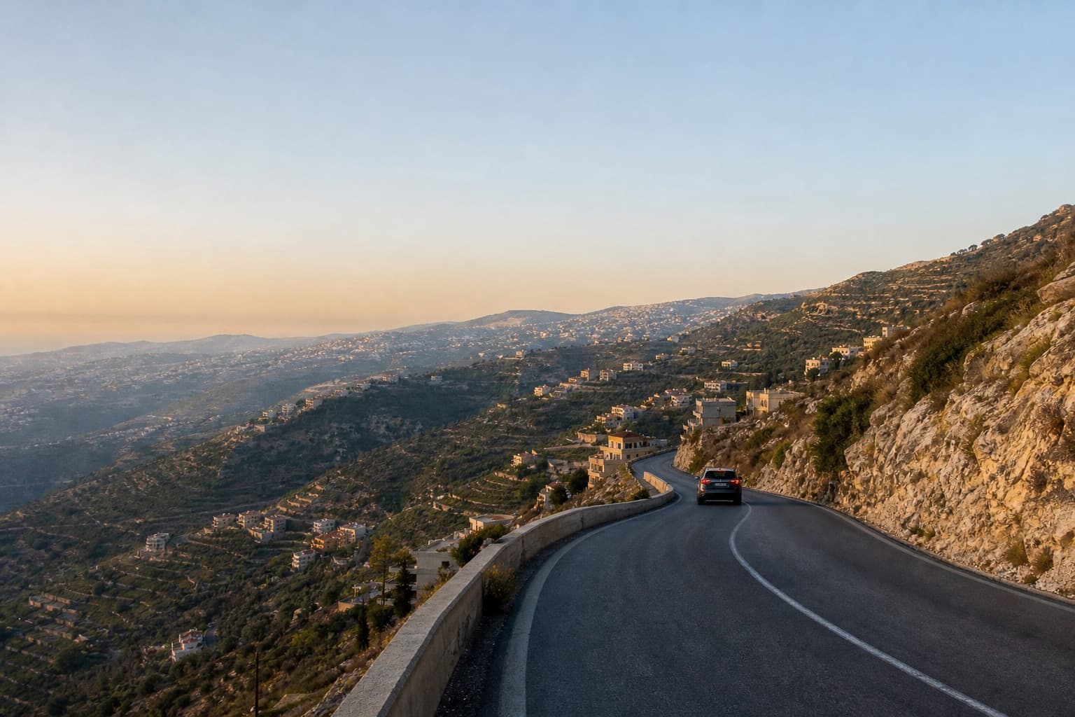 Mountain road climbing through the Kesrouan hills toward Faqra